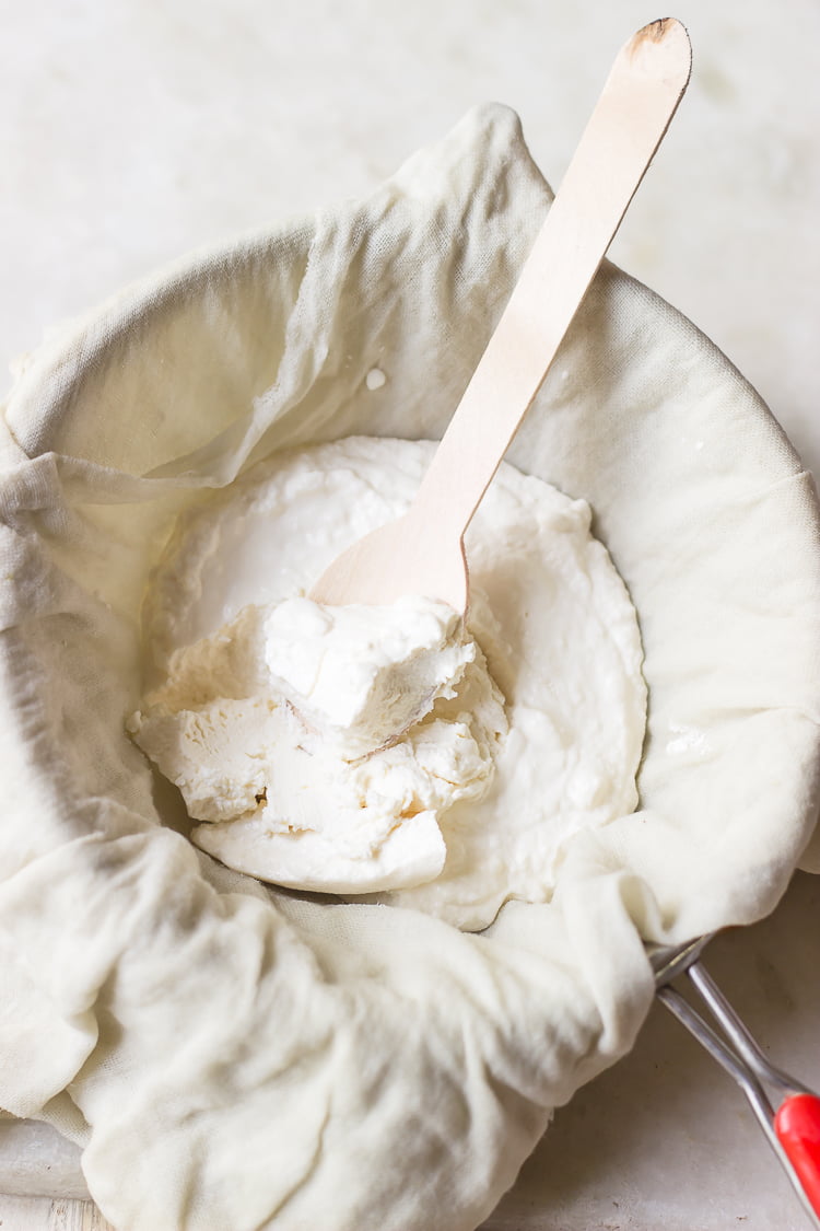 Freshly prepared homemade mascarpone cheese in a glass bowl