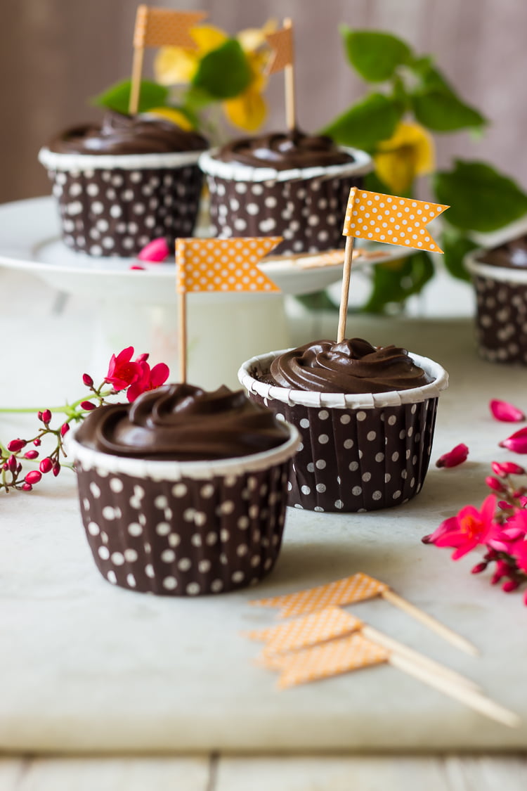 Eggless chocolate truffle cupcakes topped with glossy ganache