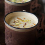 Gur ki Kheer in a decorative bowl, adorned with a mix of almonds, pistachios, and cashews