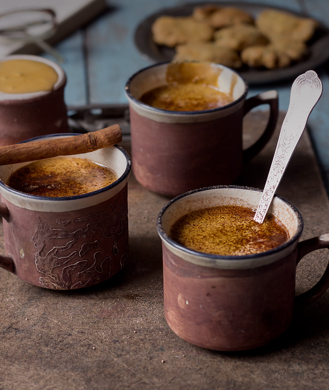 Coffee Whisking coffee and sugar mixture in a cup with a spoon