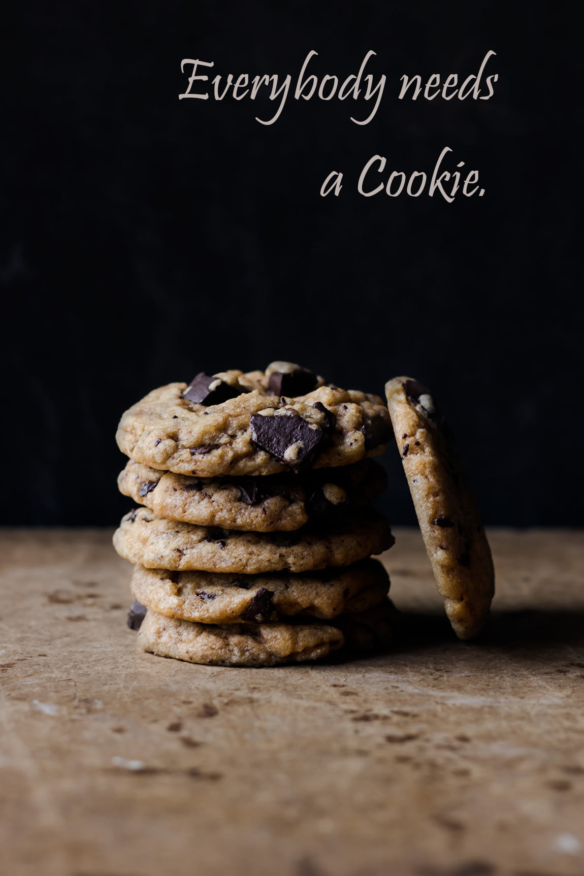 A close-up of rich, dark chocolate chunks embedded in a cookie