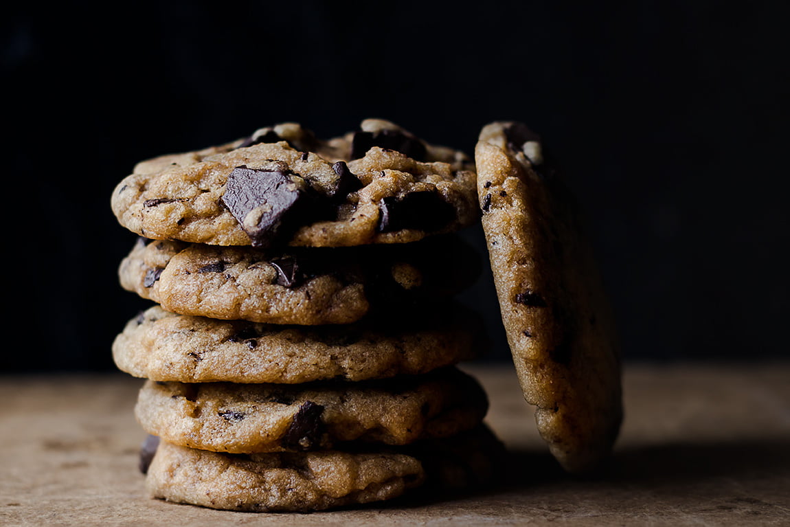 Freshly baked chocolate chunk cookies with melted chocolate oozing out
