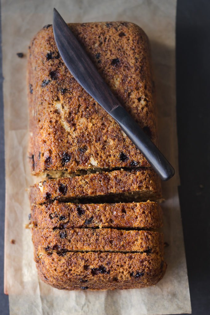 Sliced banana walnut bread with a golden crust and moist texture