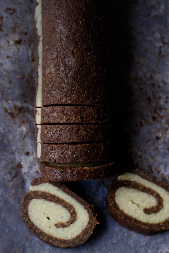 Rolled cookie dough showing chocolate and vanilla layers