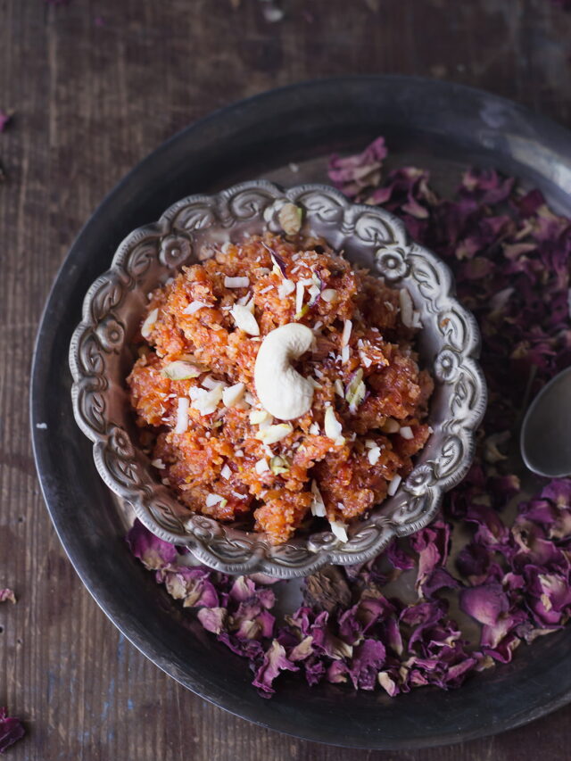 Close-up shot of the rich, creamy texture of Gajar ka Halwa, with visible carrot strands and nuts