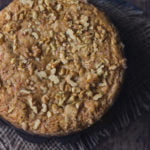 Carrot cinnamon cake fresh out of the oven, cooling on a wire rack