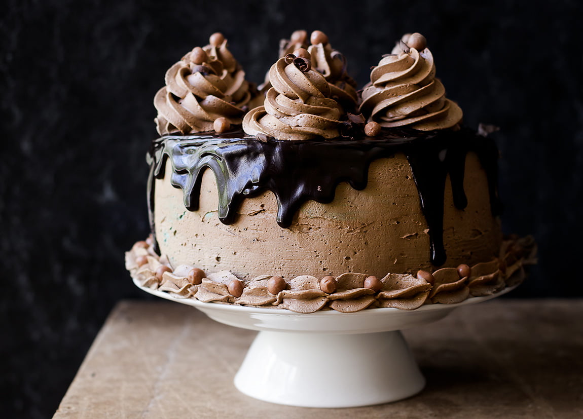 Homemade eggless coffee whiskey cake topped with chocolate chips