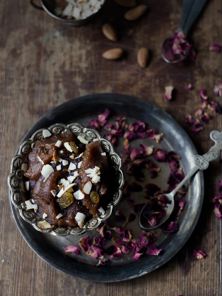 Aate Ka Halwa served in a traditional brass bowl with a spoon