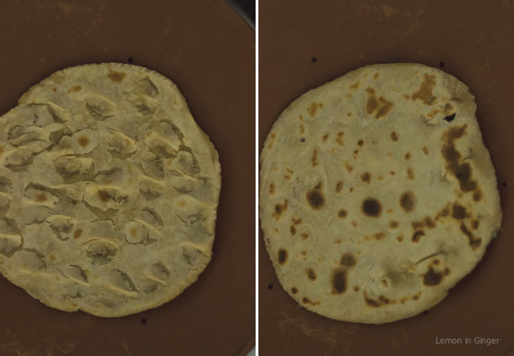 Golden-brown Angakadi being cooked on an iron tawa