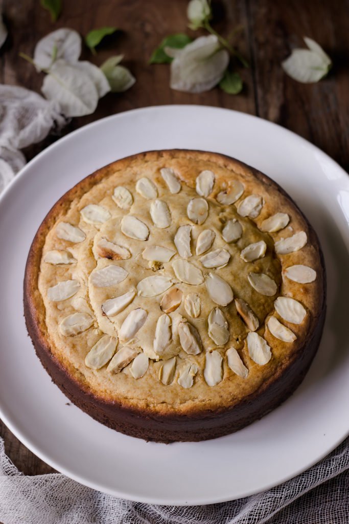 A festive presentation of Eggless Mawa Cake with saffron strands