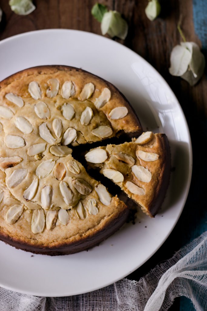 Close-up of a freshly baked Eggless Mawa Cake with a golden-brown crust