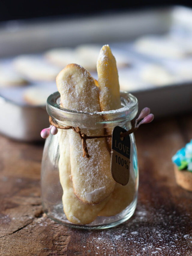 Freshly baked Eggless Lady Fingers in a jar