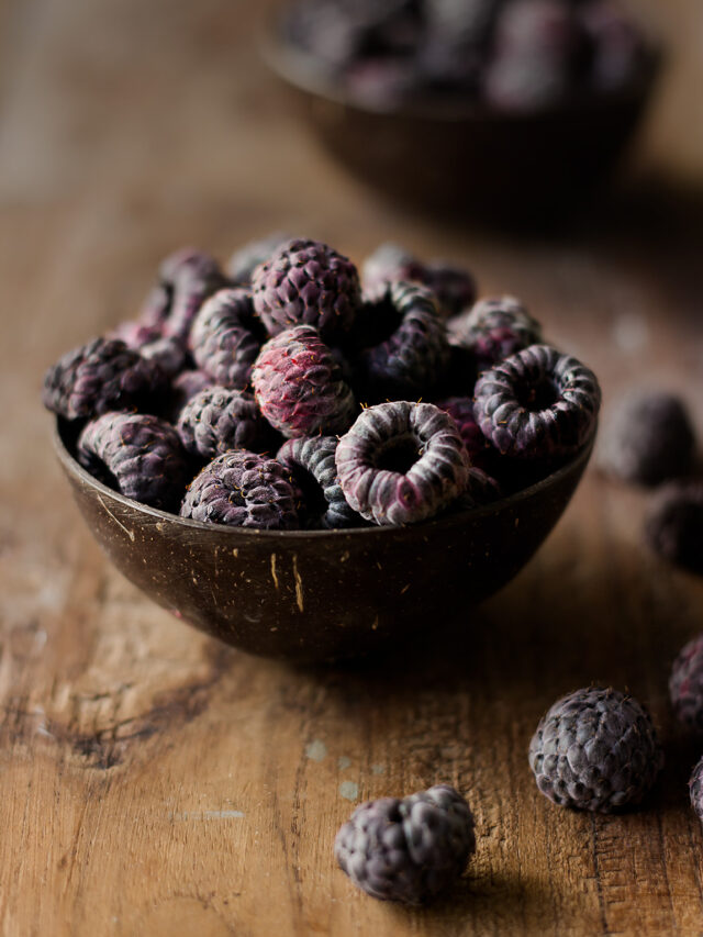 A bowl full of nutritious Raspberries, looking very tempting and juicy