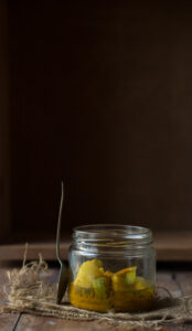 A jar of homemade mango pickle ready to enjoy as a side dish