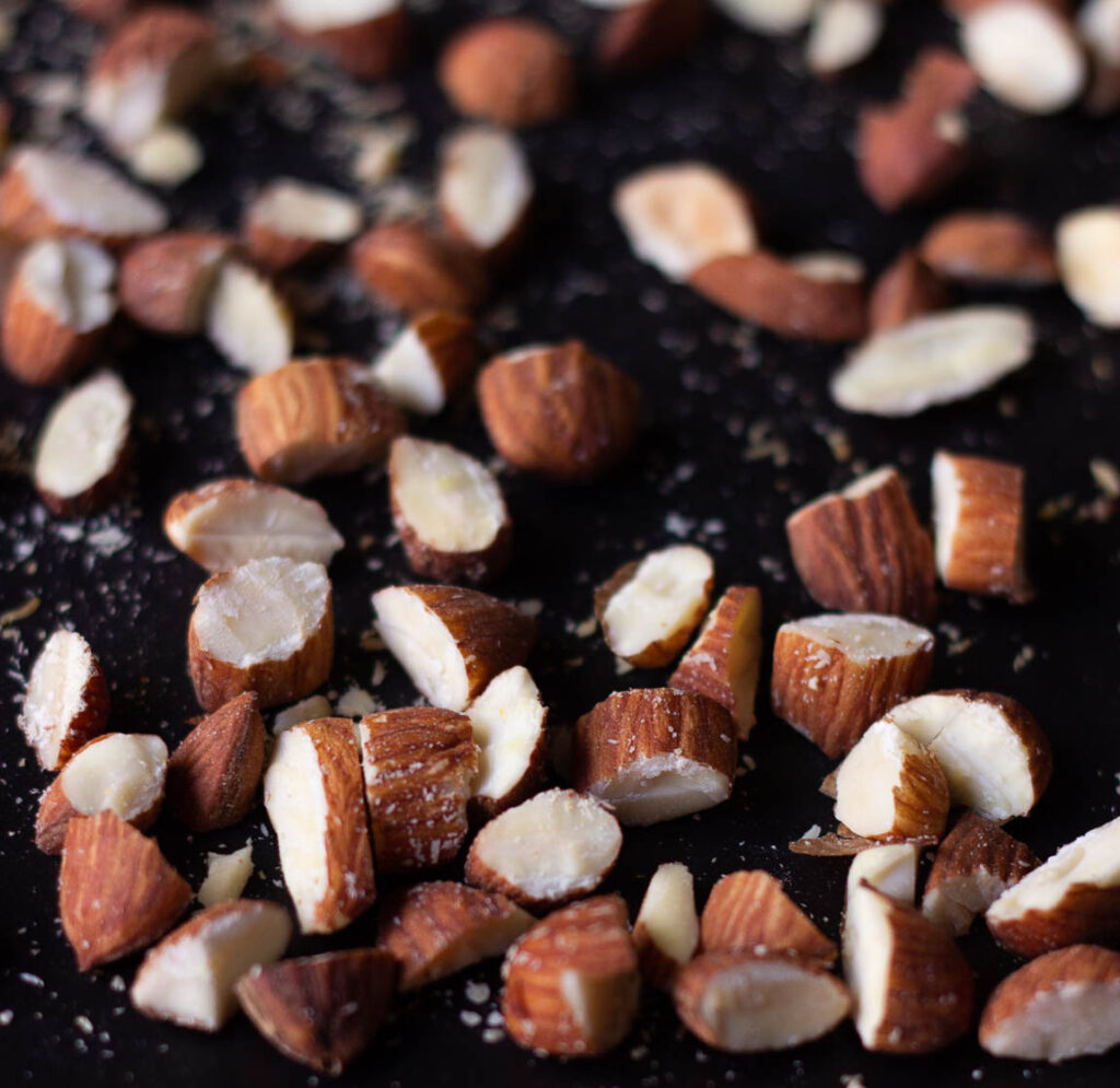 Close-up of toasted almonds embedded in rich chocolate biscotti
