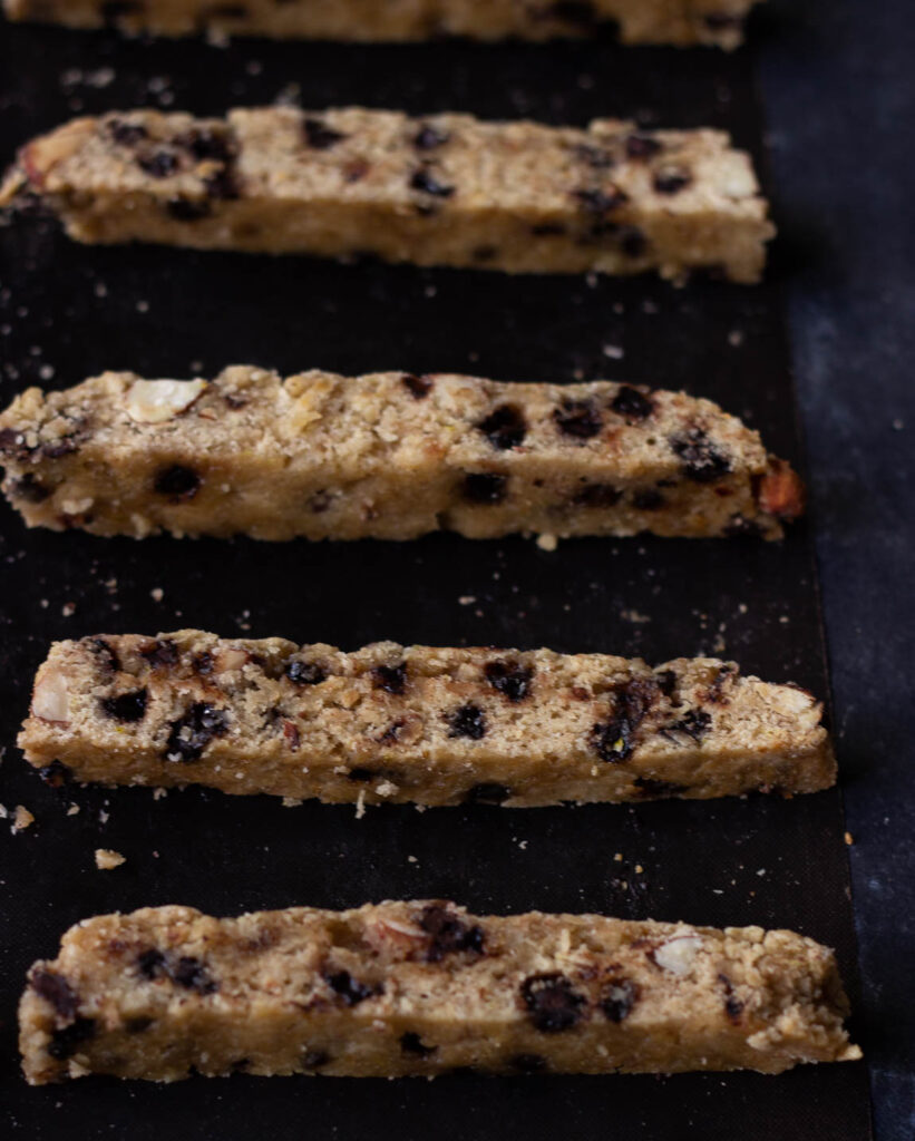 Biscotti close-up with chocolate chips melting slightly on the surface
