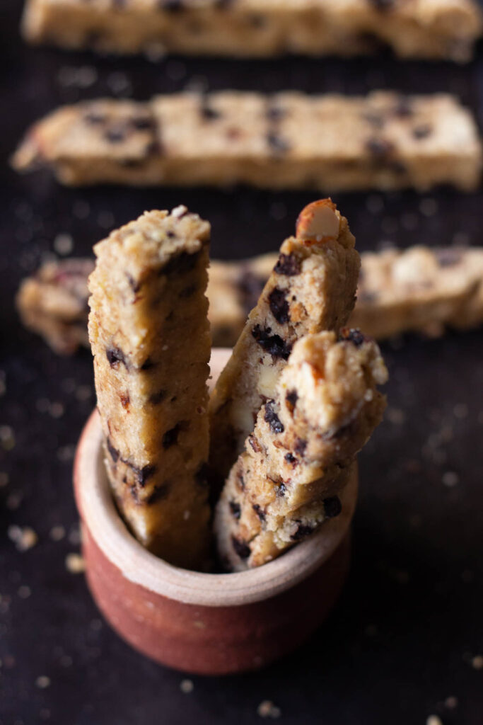 Freshly baked chocolate almond biscotti kept inside the cup