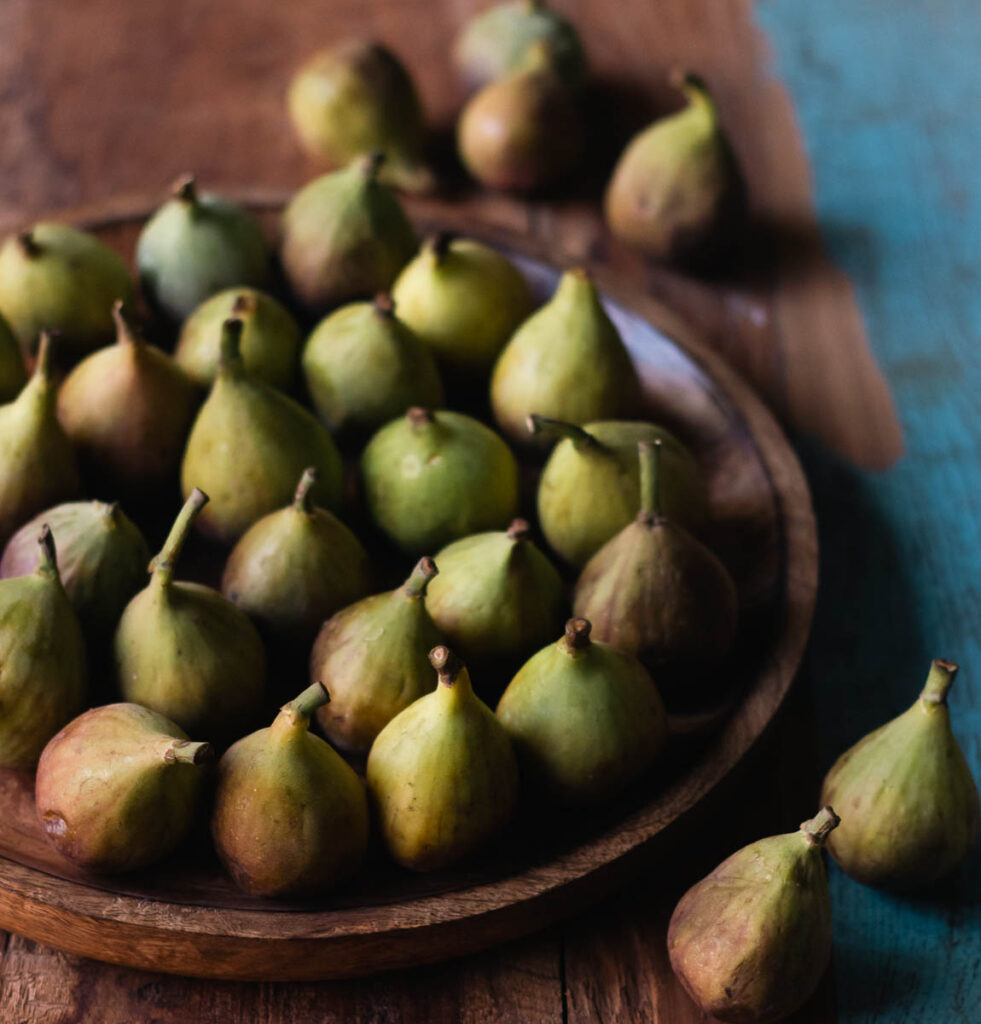 Fresh figs on a plate, demonstrating their versatility in healthy snacks