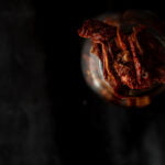 A jar filled with homemade sun-dried tomatoes