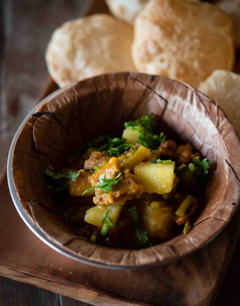 Homemade singri aloo ki sabzi cooked with mogri and potatoes